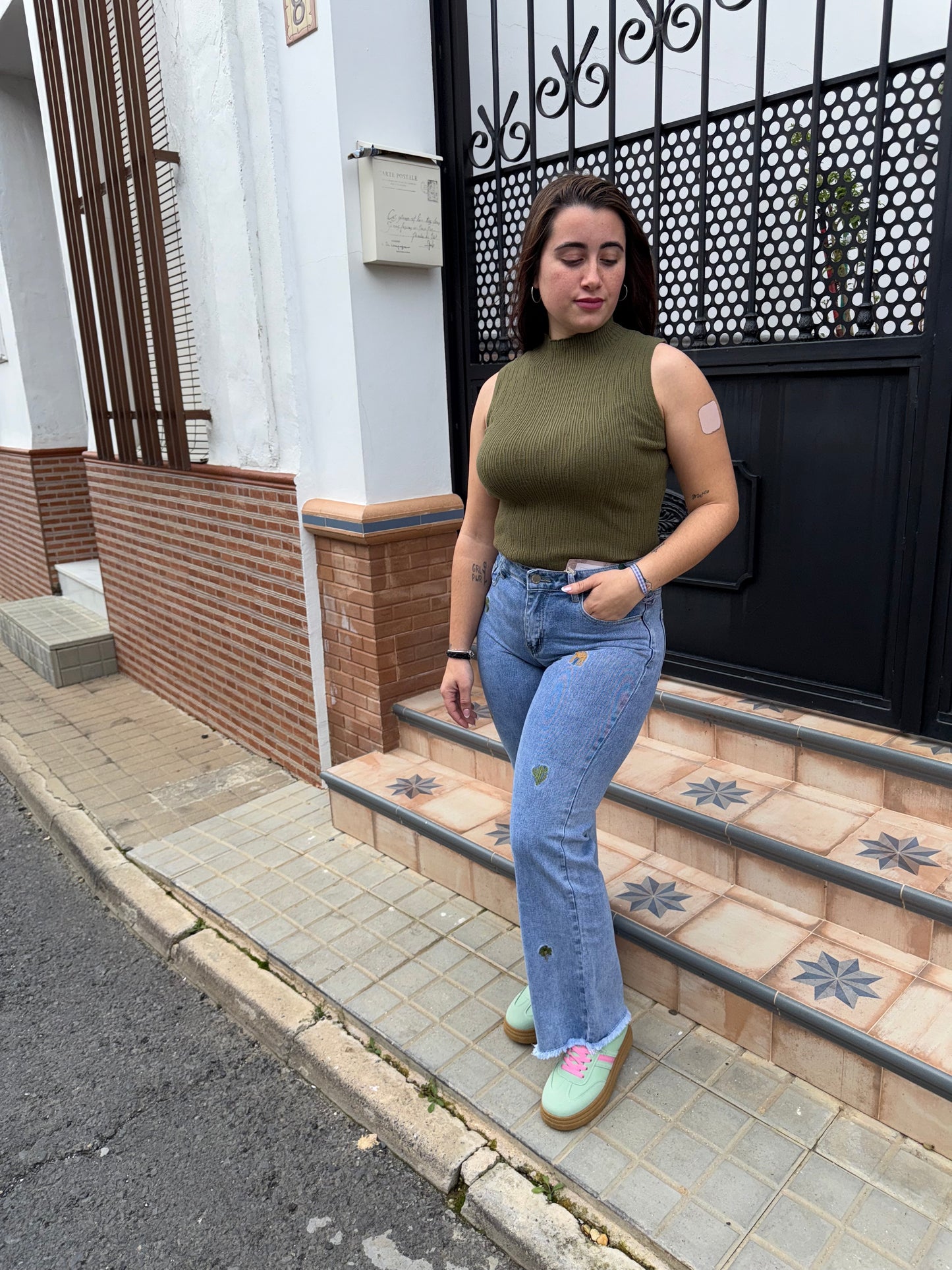 Top sin mangas verde